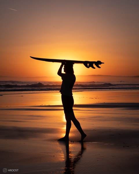 Surfer on sunrise